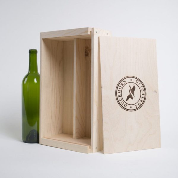 2 TALL Bottles Pinewood box with horizontal sliding lid and fixed wood dividers. USA sourced, FSC Certified Pinewood. Thickness 3/4". Birch plywood Lid . Nails assembly. Printing: One ( 1 color ) silkscreen) or fire branding on Lid INSIDE DIMENSIONS: 13-1/4" L x 7-1/8" W x 3-3/8" H OUTSIDE DIMENSIONS: 14-3/4" L x 7-3/4" W x 4-1/4" H