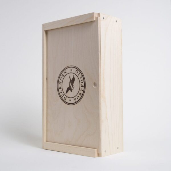 2 Bottles Pinewood box with horizontal sliding lid and fixed wood dividers. USA sourced, FSC Certified Pinewood. Thickness 3/4". Birch plywood Lid . Nails assembly. Printing: One ( 1 color ) silkscreen) or fire branding on Lid INSIDE DIMENSIONS: 12-1/4" L X 7-1/8" W X 3-3/8" H OUTSIDE DIMENSIONS: 13-3/4" L X 7-7/8" W X 4-1/4" H