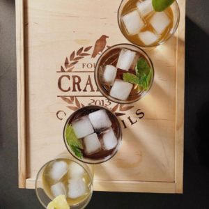 crafted cocktail Custom Branded Wood Box for Spirits & alcohol with cocktails arranged on top of wooden box